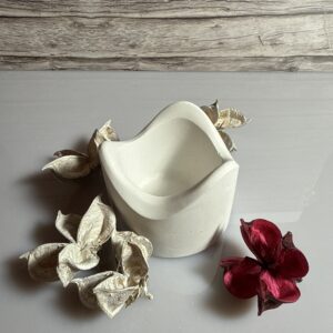 Teelicht geschwungen